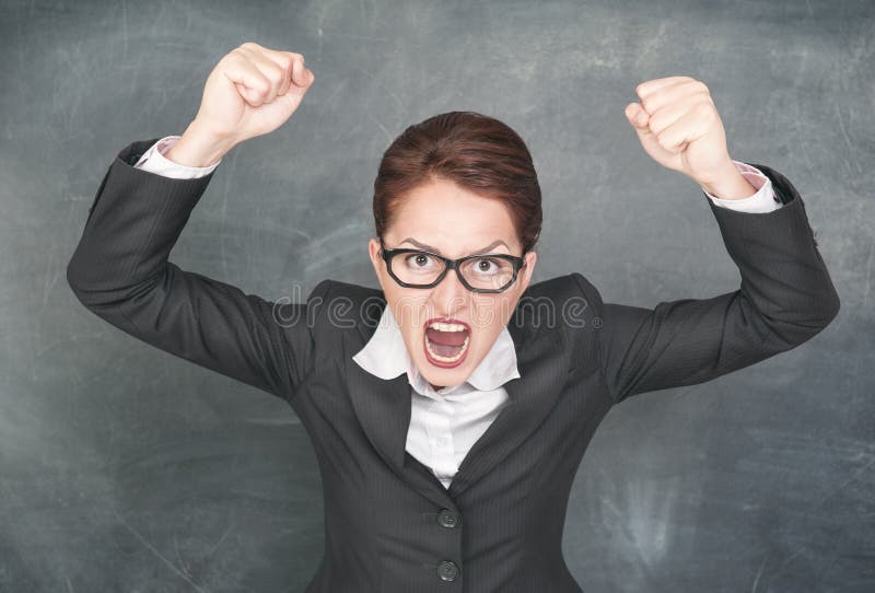 Angry screaming woman in glasses. Angry screaming woman in glasses