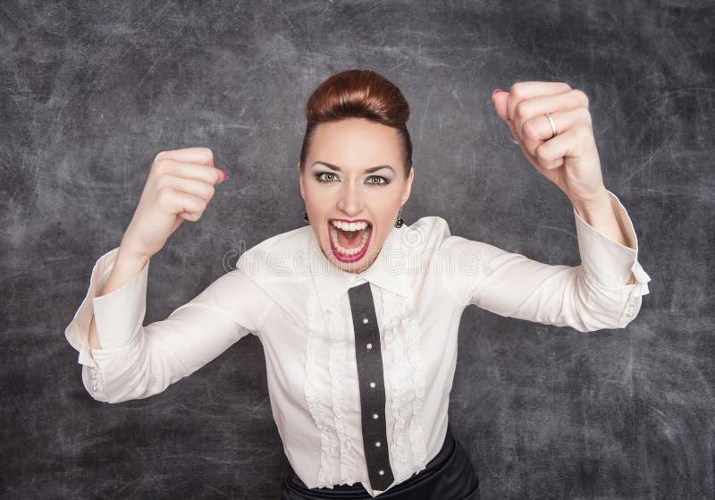 Angry screaming teacher on the blackboard background. Angry screaming teacher on the blackboard background