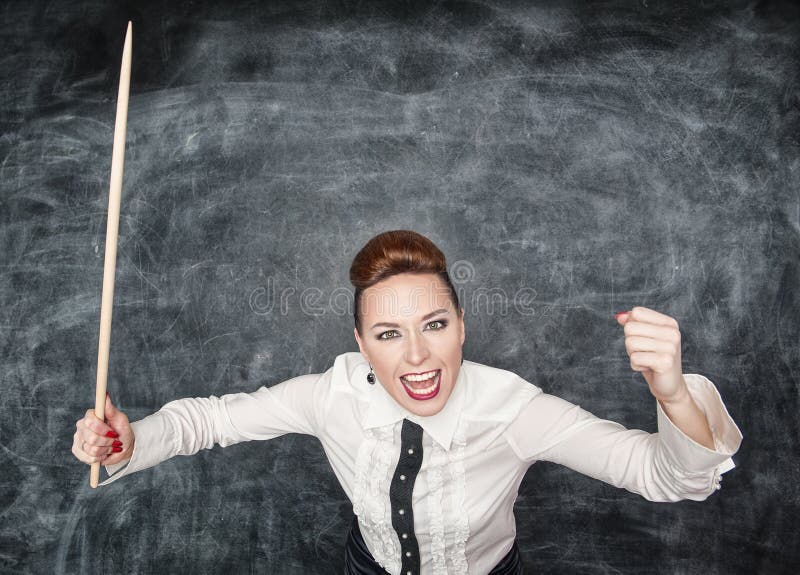 Angry screaming teacher with pointer in her hand. Angry screaming teacher with pointer in her hand