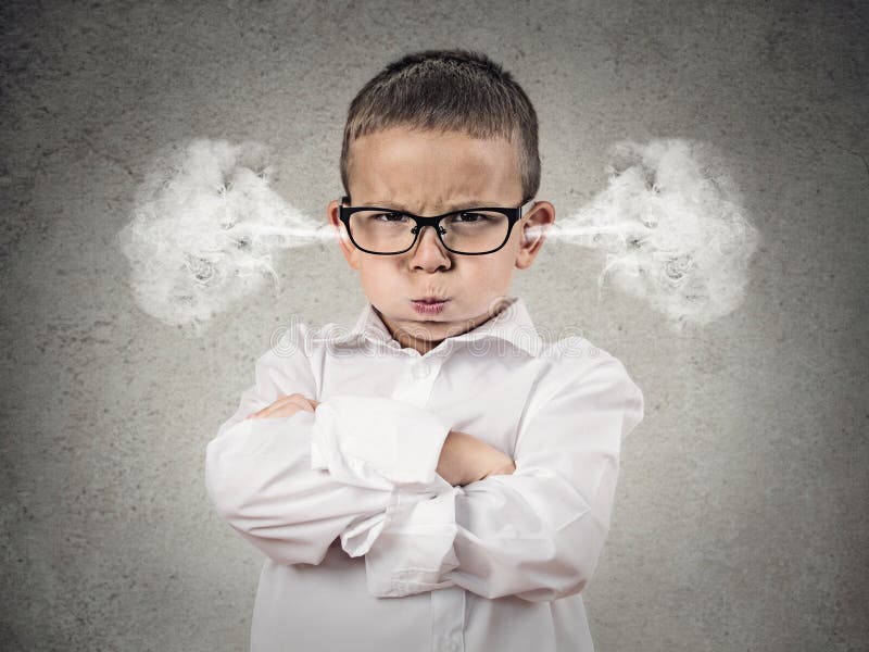 Closeup portrait Angry young Boy, Blowing Steam coming out of ears, about have Nervous atomic breakdown, isolated grey background. Negative human emotions, Facial Expression, feeling attitude reaction. Closeup portrait Angry young Boy, Blowing Steam coming out of ears, about have Nervous atomic breakdown, isolated grey background. Negative human emotions, Facial Expression, feeling attitude reaction