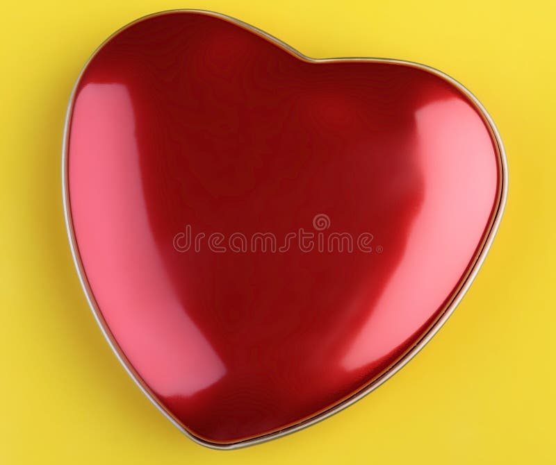 Heart-shaped Tin on yellow background. Heart-shaped Tin on yellow background.