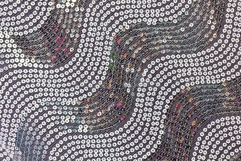 Silver buttons pattern on fabric for background. Silver buttons pattern on fabric for background.