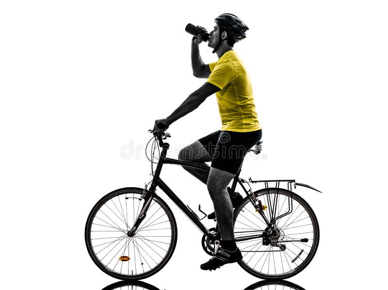 One caucasian man exercising bicycle mountain bike drinking on white background. One caucasian man exercising bicycle mountain bike drinking on white background