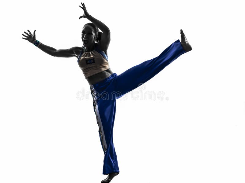 Силуэт танцев танцора capoeira женщины стоковое фото rf Силуэт танцев танцора capoeira женщины стоковое фото rf