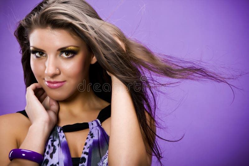 Portrait of beautiful young woman with flying long hair. Portrait of beautiful young woman with flying long hair