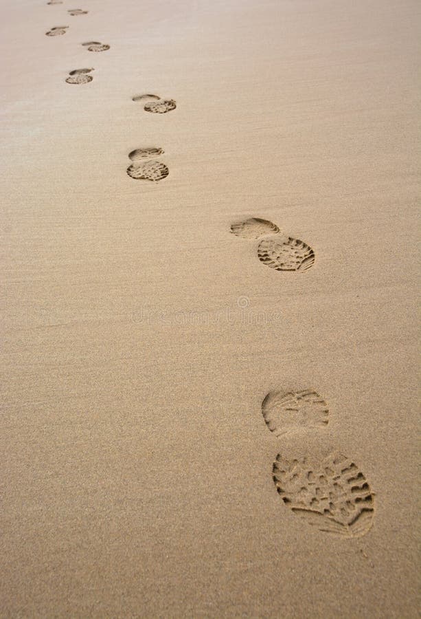 Lonely single track in the sand of a beach. Lonely single track in the sand of a beach