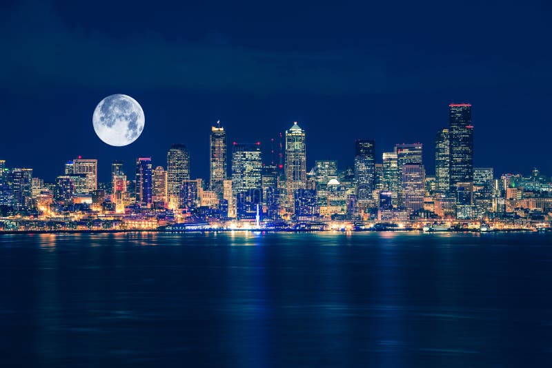 Seattle and the Moon Night Skyline. Seattle, Washington, United States. Seattle and the Moon Night Skyline. Seattle, Washington, United States.