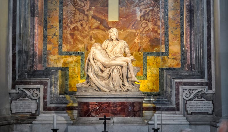 The Pieta Mother Mary and Jesus Christ sculpture in St. Peter`s Basilica by Michelangelo. The Pieta Mother Mary and Jesus Christ sculpture in St. Peter`s Basilica by Michelangelo