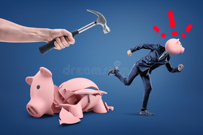 Broken piggy bank and businessman with piggy bank head running from hand with hammer on blue background. Business and management. Money and finance. Broken piggy bank and businessman with piggy bank head running from hand with hammer on blue background. Business and management. Money and finance.