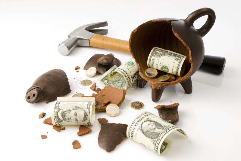 A broken and empty clay piggy money box with money and hammer over white background. A broken and empty clay piggy money box with money and hammer over white background