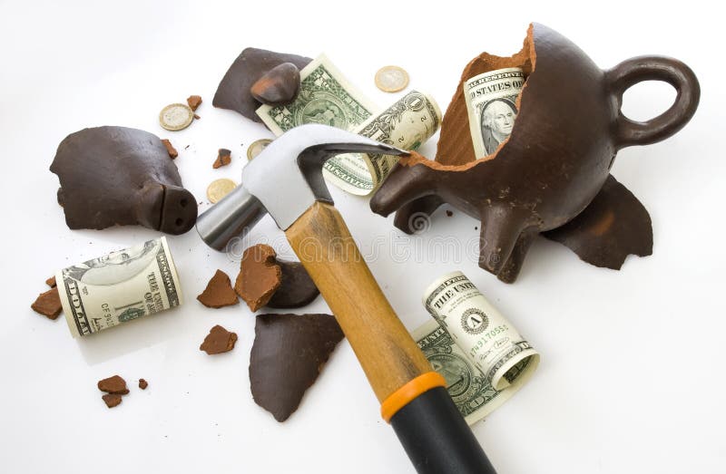 A broken and empty clay piggy money box with money and hammer over white background. A broken and empty clay piggy money box with money and hammer over white background