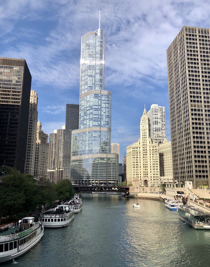 This is a Fall picture looking West up the Chicago River located in Chicago, Illinois in Cook County. This picture features the DuSable Bridge in the and iconic Chicago skyscrapers in the background. This picture was taken on October 3, 2018. This is a Fall picture looking West up the Chicago River located in Chicago, Illinois in Cook County. This picture features the DuSable Bridge in the and iconic Chicago skyscrapers in the background. This picture was taken on October 3, 2018.