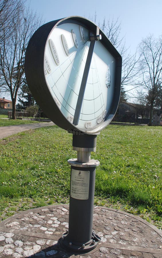 The Height Sundial (or Orologio Solare d'Altezza) in Piazza Donatori di Sangue in Aiello del Friuli, Italy. This 2 metre high, 1.25 metre wide 2006 sundial is made of iron with a glass frame. The Height Sundial (or Orologio Solare d'Altezza) in Piazza Donatori di Sangue in Aiello del Friuli, Italy. This 2 metre high, 1.25 metre wide 2006 sundial is made of iron with a glass frame