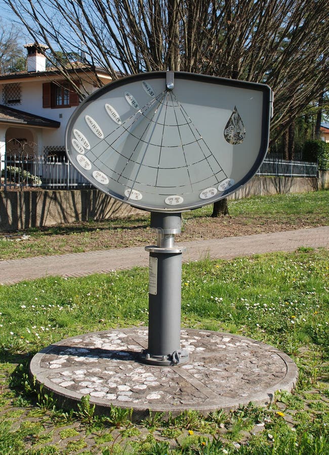 The Height Sundial (or Orologio Solare d'Altezza) in Piazza Donatori di Sangue in Aiello del Friuli, Italy. This 2 metre high, 1.25 metre wide 2006 sundial is made of iron with a glass frame. The Height Sundial (or Orologio Solare d'Altezza) in Piazza Donatori di Sangue in Aiello del Friuli, Italy. This 2 metre high, 1.25 metre wide 2006 sundial is made of iron with a glass frame