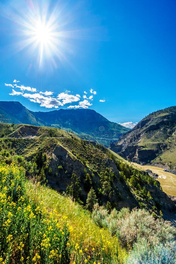 Sun shining over the Fraser River as it flows to the town of Lillooet in the Chilcotin region on British Columbia. Sun shining over the Fraser River as it flows to the town of Lillooet in the Chilcotin region on British Columbia