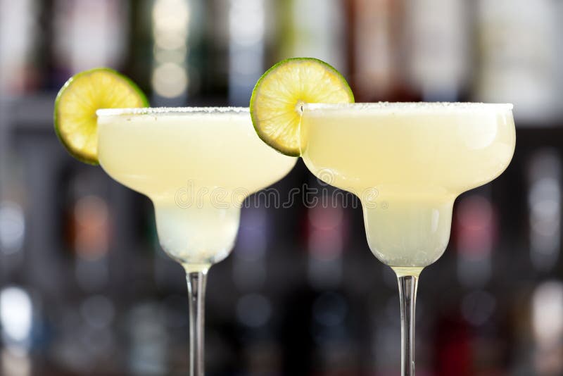 The margarita is a cocktail consisting of tequila mixed with orange-flavoured liqueur and lime or lemon juice, often served with salt on the glass rim.The drink is served shaken with ice, on the rocks, blended with ice (frozen margarita) or without ice (straight up). Ingredients: 1 1/2 oz tequila 1/2 oz triple sec 1 oz lime juice salt. The margarita is a cocktail consisting of tequila mixed with orange-flavoured liqueur and lime or lemon juice, often served with salt on the glass rim.The drink is served shaken with ice, on the rocks, blended with ice (frozen margarita) or without ice (straight up). Ingredients: 1 1/2 oz tequila 1/2 oz triple sec 1 oz lime juice salt