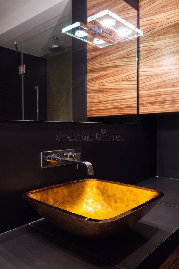 Modern illuminated washbasin in luxury contemporary toilet. Modern illuminated washbasin in luxury contemporary toilet