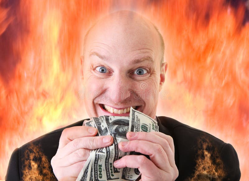 Avarice, businessman with money. man or devil holding dollars in display of greed in hell fire. A Deadly sin. Avarice, businessman with money. man or devil holding dollars in display of greed in hell fire. A Deadly sin