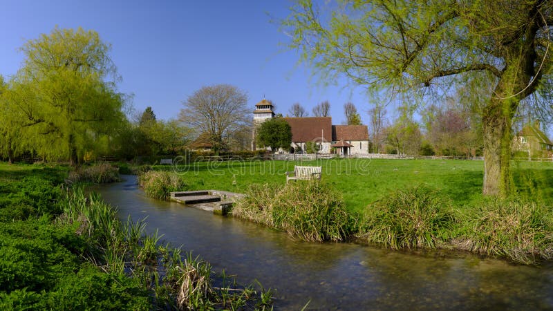 Meonstoke, UK - April 1, 2019:  The first day of April 2019 brings beautiful spring weather and light onto the Meon Valley village of Meonstoke and the unique church of St Andrew\'s.  This is a fine example of an Early English church, Grade II listed, with few later alterations, leaving it internally in all the serenity associated with that era. The roof and aisles were raised in the 18th century,. Meonstoke, UK - April 1, 2019:  The first day of April 2019 brings beautiful spring weather and light onto the Meon Valley village of Meonstoke and the unique church of St Andrew\'s.  This is a fine example of an Early English church, Grade II listed, with few later alterations, leaving it internally in all the serenity associated with that era. The roof and aisles were raised in the 18th century,