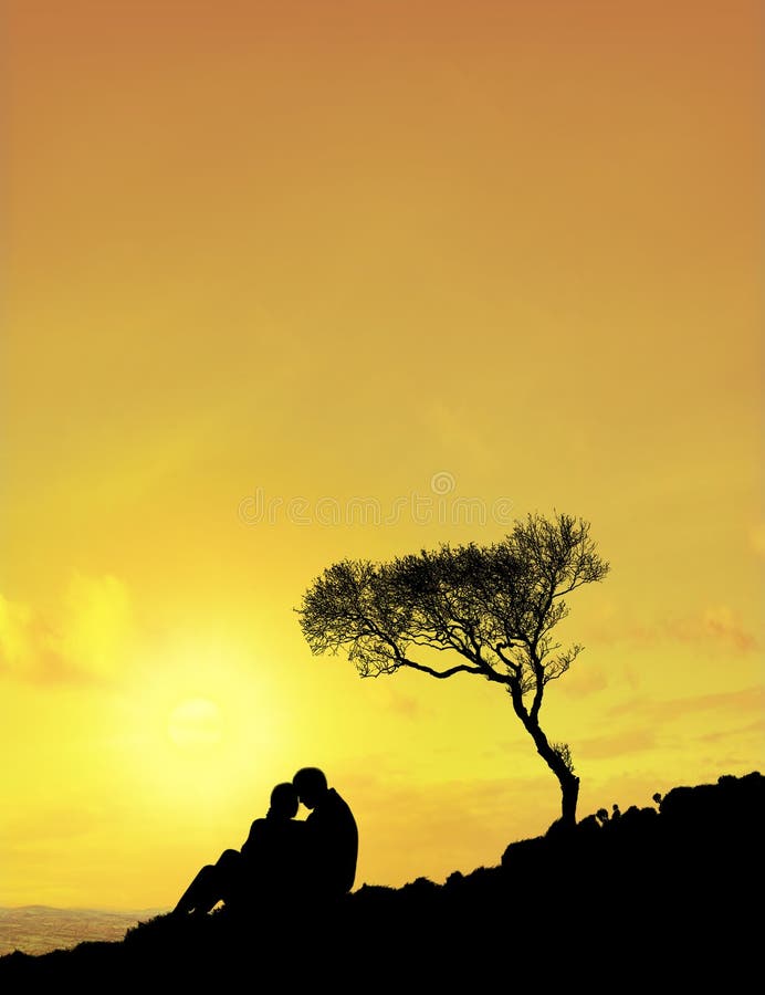 Silhouette of father and son on the foreground with the sky on background. Silhouette of father and son on the foreground with the sky on background.