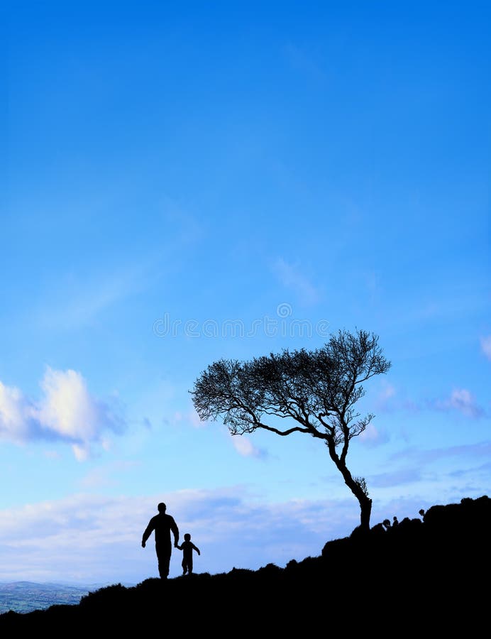 Silhouette of father and son on the foreground with the sky on background. Silhouette of father and son on the foreground with the sky on background.