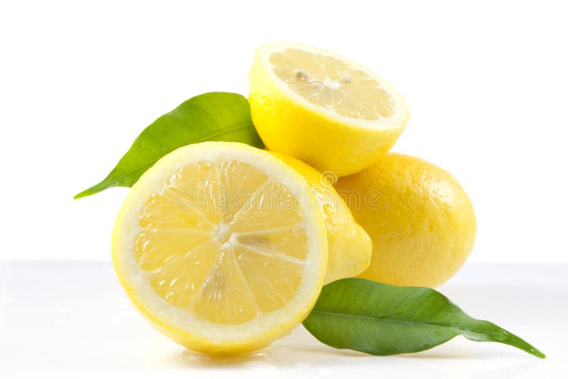 Composition of lemons with green leaves. Composition of lemons with green leaves