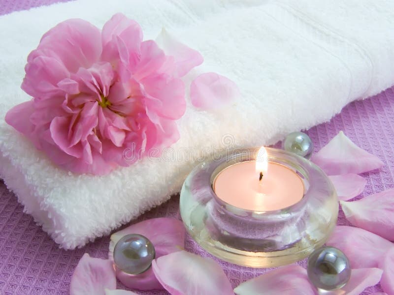 Body relax composition with aromatic candle and petals of rose. Body relax composition with aromatic candle and petals of rose