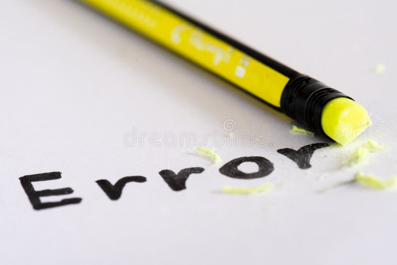 Erase the word Error with a rubber concept of eliminating the error, mistake. closeup of a pencil erasing an `error`. Erase the word Error with a rubber concept of eliminating the error, mistake. closeup of a pencil erasing an `error`.