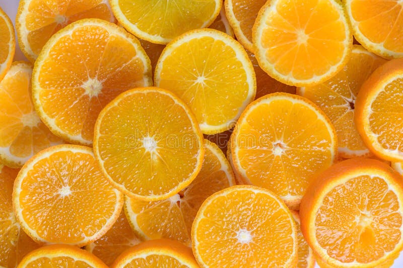 juicy tangerines cut into circles as a background 2. juicy tangerines cut into circles as a background 2