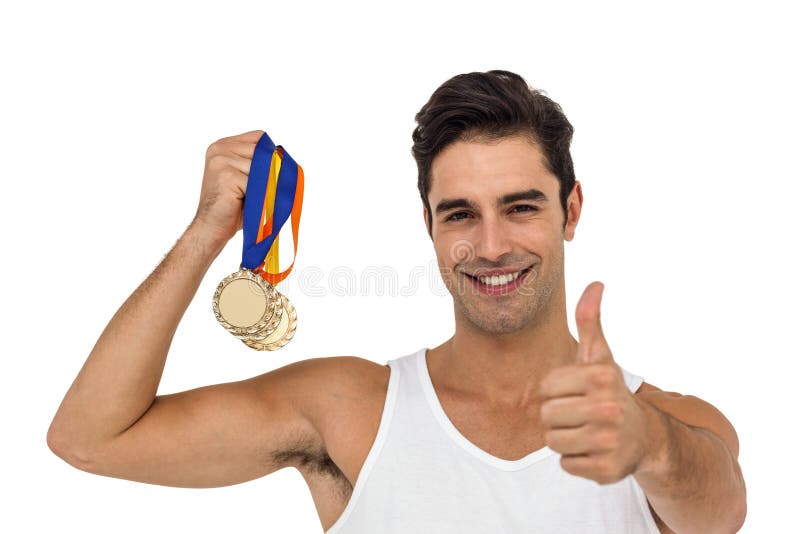 Portrait of athlete holding gold medals and posing on white background. Portrait of athlete holding gold medals and posing on white background