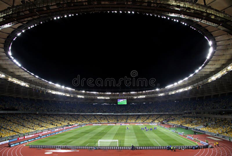 KYIV, UKRAINE - NOVEMBER 11, 2011: Panoramic view of Olympic stadium (NSC Olimpiysky) during friendly football game between Ukraine and Germany on November 11, 2011 in Kyiv, Ukraine. There is 1st game on this stadium after reconstruction. KYIV, UKRAINE - NOVEMBER 11, 2011: Panoramic view of Olympic stadium (NSC Olimpiysky) during friendly football game between Ukraine and Germany on November 11, 2011 in Kyiv, Ukraine. There is 1st game on this stadium after reconstruction