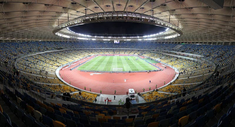 KYIV, UKRAINE - NOVEMBER 11, 2011: Panoramic view of Olympic stadium (NSC Olimpiysky) during friendly football game between Ukraine and Germany on November 11, 2011 in Kyiv, Ukraine. There is 1st game on this stadium after reconstruction. KYIV, UKRAINE - NOVEMBER 11, 2011: Panoramic view of Olympic stadium (NSC Olimpiysky) during friendly football game between Ukraine and Germany on November 11, 2011 in Kyiv, Ukraine. There is 1st game on this stadium after reconstruction