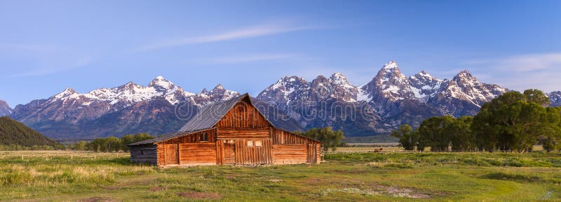 Old barn in front of the Grand Tetons in Wyoming. Old barn in front of the Grand Tetons in Wyoming