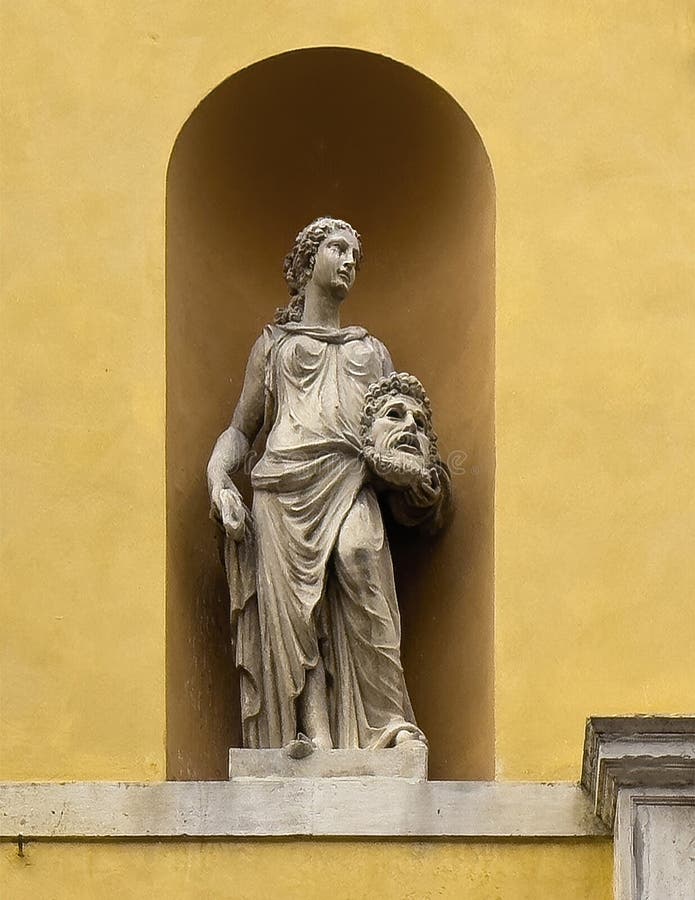 Pictured is a statue of the Muse of Tragedy, Melpomene, with her tragic mask on the exterior of the Teatro Communale Alighieri, an opera house located at 2 Via Miriani in Ravenna, Italy. The theatre was designed by Venetian architects, Tommaso Meduna and his brother Giambattista and was inaugurated on the 15th of May 1852. It was named for the famous poet, Dante Aligheri who spent the last four years of his life in Ravenna. Reflecting the style of the Venetian brothers, the exterior of the Alighieri is neo-classical with a four ionic columns and a portico with statues of four Muses. Pictured is a statue of the Muse of Tragedy, Melpomene, with her tragic mask on the exterior of the Teatro Communale Alighieri, an opera house located at 2 Via Miriani in Ravenna, Italy. The theatre was designed by Venetian architects, Tommaso Meduna and his brother Giambattista and was inaugurated on the 15th of May 1852. It was named for the famous poet, Dante Aligheri who spent the last four years of his life in Ravenna. Reflecting the style of the Venetian brothers, the exterior of the Alighieri is neo-classical with a four ionic columns and a portico with statues of four Muses.