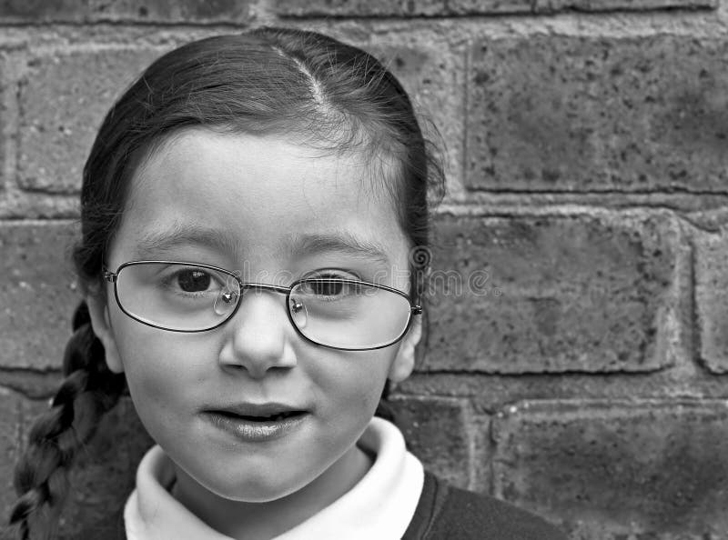 Portrait of young girl wearing glasses. Portrait of young girl wearing glasses