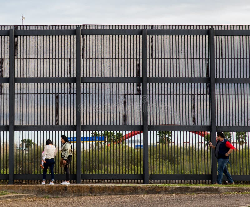 US Mexico Border Wall along the Rio Grande river, Brownsville Texas. US Mexico Border Wall along the Rio Grande river, Brownsville Texas