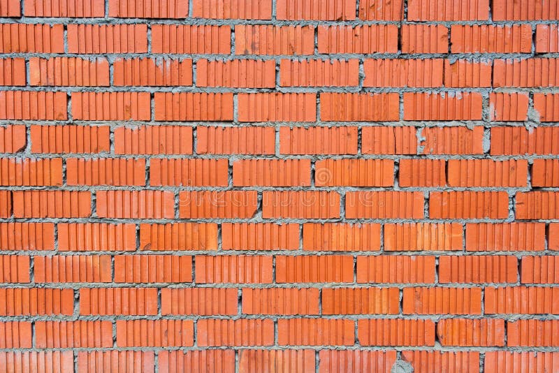 Стена красного кирпича с рифленной текстурой стоковые фото Стена красного кирпича с рифленной текстурой стоковые фото