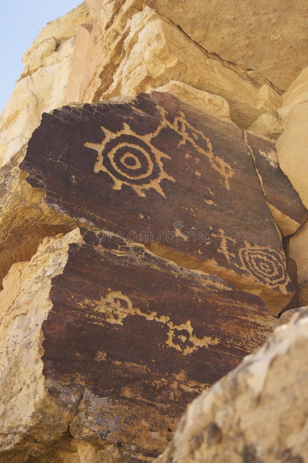 Ancient petroglyphs on rock wall found on the Hopi Mesa near Tuba City, Arizona. Ancient petroglyphs on rock wall found on the Hopi Mesa near Tuba City, Arizona.