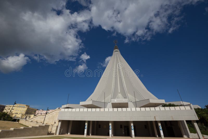 Syracuse, Italy - January 2, 2017: Sanctuary of Our Lady of Tears, the church was designed by French architects Michel Arnault and Pierre Parat. Syracuse, Italy - January 2, 2017: Sanctuary of Our Lady of Tears, the church was designed by French architects Michel Arnault and Pierre Parat