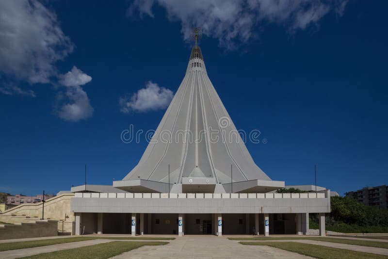 Syracuse, Italy - January 2, 2017: Sanctuary of Our Lady of Tears, the church was designed by French architects Michel Arnault and Pierre Parat. Syracuse, Italy - January 2, 2017: Sanctuary of Our Lady of Tears, the church was designed by French architects Michel Arnault and Pierre Parat