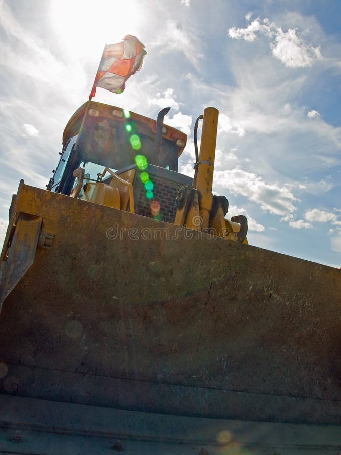 Bulldozer Construction Equipment parked at work site. Bulldozer Construction Equipment parked at work site