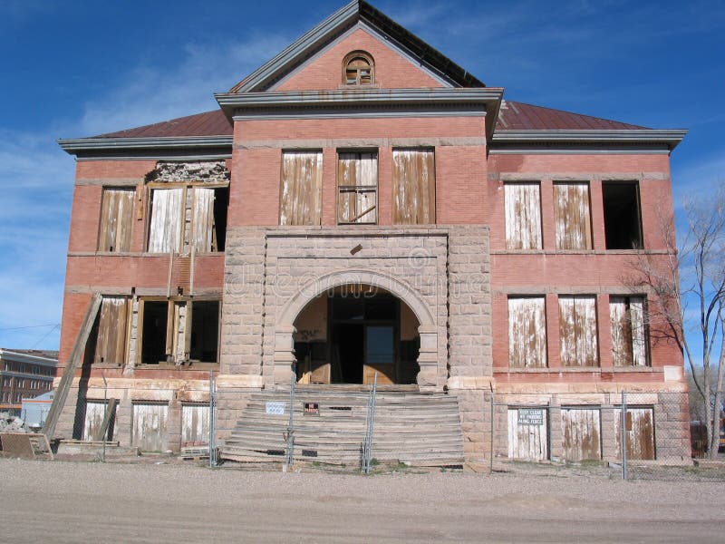 Once the pride of a town, an old high school building has fallen into disrepair and decay. Once the pride of a town, an old high school building has fallen into disrepair and decay.