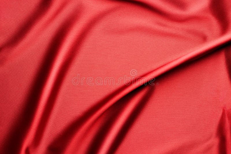 Струят красная silk ткань стоковое изображение rf Струят красная silk ткань стоковое изображение rf