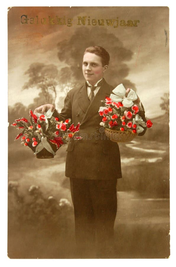 Belgium - Circa 1920: Reproduction of antique greeting postcard printed in Belgium shows stylish young man with a bouquet, circa 1920. Belgium - Circa 1920: Reproduction of antique greeting postcard printed in Belgium shows stylish young man with a bouquet, circa 1920