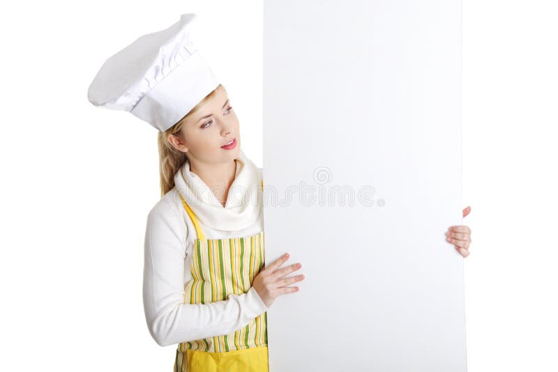 Happy woman cook or baker holding sign billboard. Caucasian woman isolated on white background. Happy woman cook or baker holding sign billboard. Caucasian woman isolated on white background.