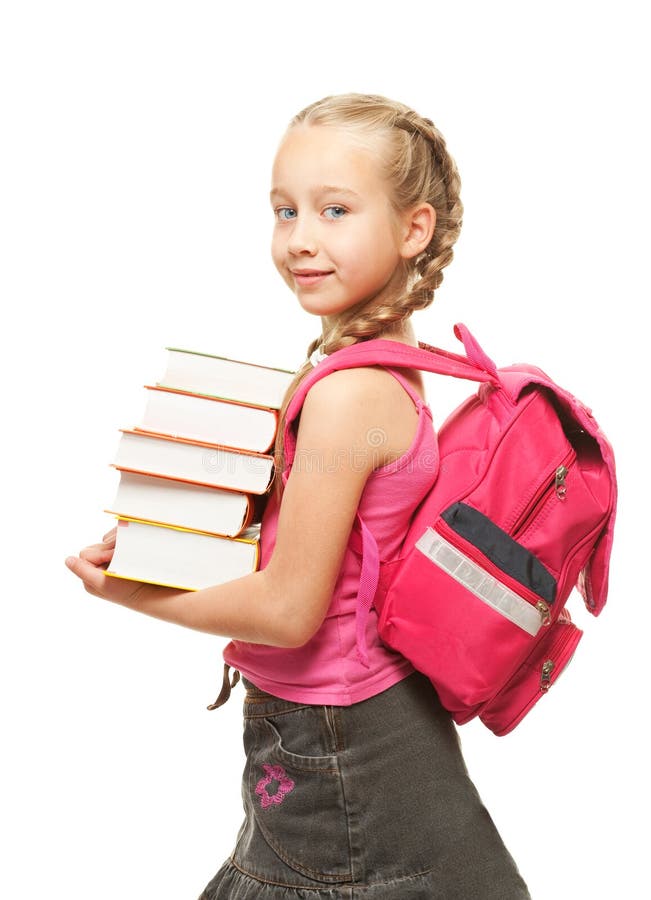 Happy little schoolgirl with a stack of heavy books. Happy little schoolgirl with a stack of heavy books