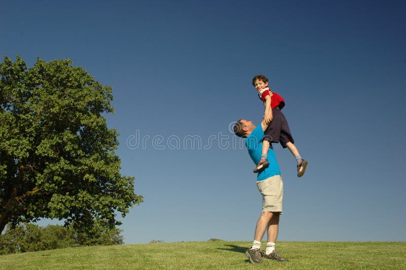 Father and son in the park. Father and son in the park