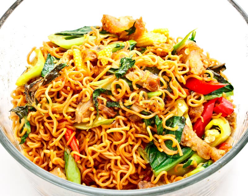 Spicy fried noodle with pork on white background. Spicy fried noodle with pork on white background