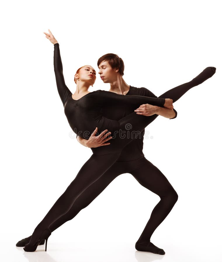 Couple of ballet dancers posing over isolated white background. Couple of ballet dancers posing over isolated white background