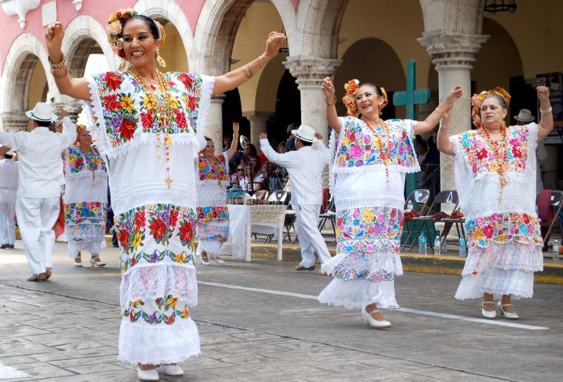 Happy ladies dancing with traditional costumes of Merida Yucatan Mexico. Happy ladies dancing with traditional costumes of Merida Yucatan Mexico